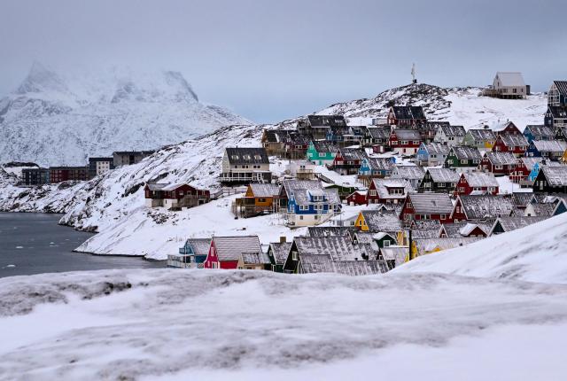 Houses of the old town are pictured in Nuuk, western Greenland, on February 4, 2026. (Photo by Ina FASSBENDER / AFP)