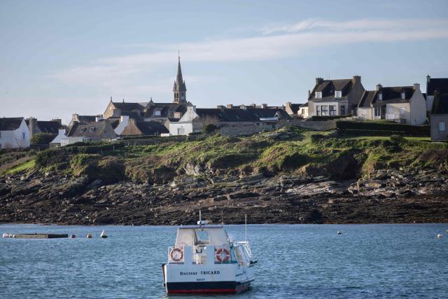 This photograph taken from a ferry boat shows Ile-Molene, western France on February 3, 2026. (Photo by Fred TANNEAU / AFP)