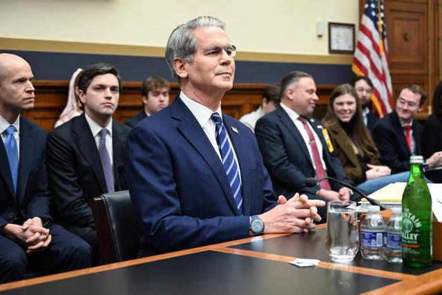 US Treasury Secretary Scott Bessent takes his seat as he arrives to testify during a House Financial Services Committee hearing on "The Annual Report of the Financial Stability Oversight Council" on Capitol Hill in Washington, DC, on February 4, 2026. (Photo by Alex WROBLEWSKI / AFP)