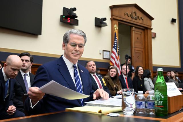 US Treasury Secretary Scott Bessent takes his seat as he arrives to testify during a House Financial Services Committee hearing on "The Annual Report of the Financial Stability Oversight Council" on Capitol Hill in Washington, DC, on February 4, 2026. (Photo by Alex WROBLEWSKI / AFP)