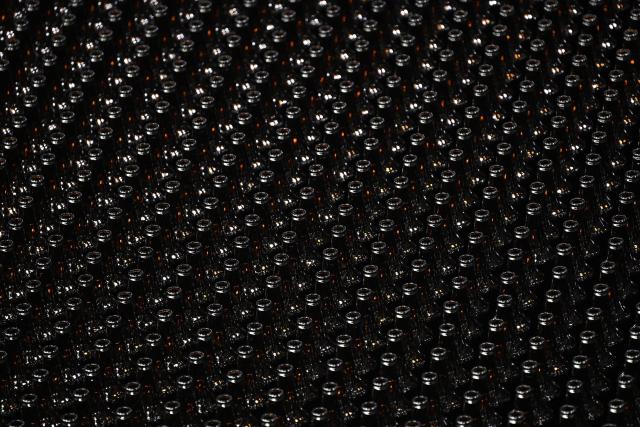 Newly manufactured bottles are prepped for filling at a factory run by British glass containers maker and filler, Encirc, in Elton, north-west England on February 4, 2026. (Photo by Paul ELLIS / AFP)