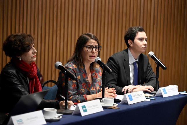 (L to R) Denise Dresser, professor and political analyst at ITAM, Juanita Goebertus (C) from Human Rights Watch, and Andre Rangel, communications director for the Americas at Human Rights Watch, attend a presentation on their analysis of the situation in Latin America as part of the launch of HRW's global report, in Mexico City on February 4, 2026. (Photo by Alfredo ESTRELLA / AFP)