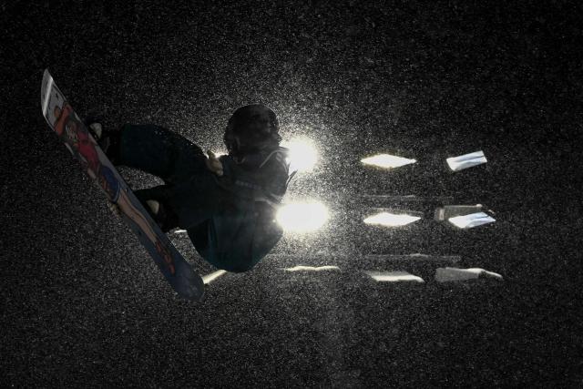 Finland's Eveliina Taka trains ahead of the snowboard men's big air qualifications during the Milano Cortina 2026 Winter Olympic Games at Livigno Snow Park, in Livigno (Valtellina), on February 4, 2026. (Photo by Jeff PACHOUD / AFP)