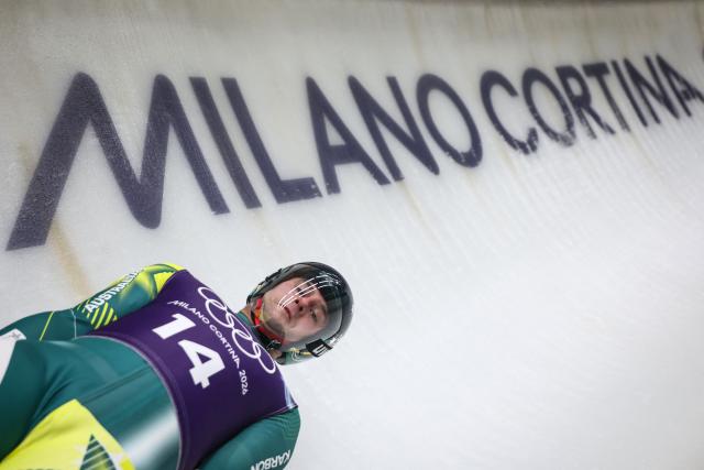 Australia's Alexander Ferlazzo takes part in the luge men's singles training session at Cortina Sliding Centre during the Milano Cortina 2026 Winter Olympic Games in Cortina d'Ampezzo on February 4, 2026. (Photo by FRANCK FIFE / AFP)