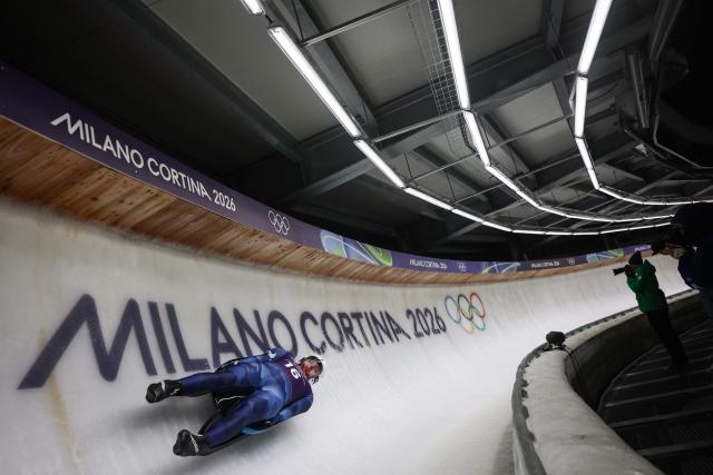 Individual Neutral Athletes' Pavel Repilov takes part in the luge men's singles training session at Cortina Sliding Centre during the Milano Cortina 2026 Winter Olympic Games in Cortina d'Ampezzo on February 4, 2026. (Photo by FRANCK FIFE / AFP)