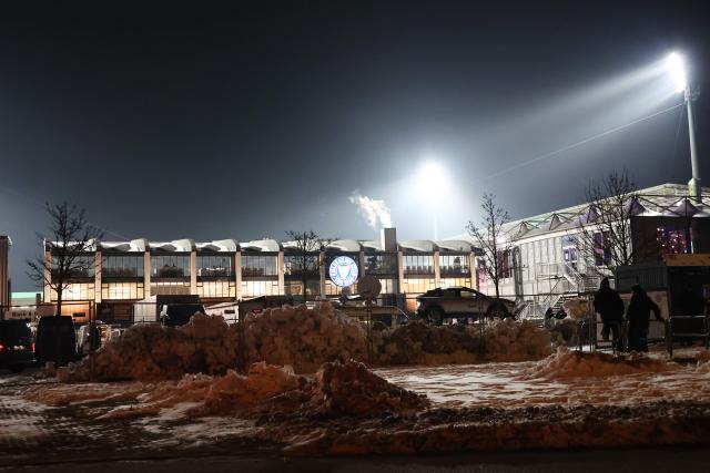 Snowdrifts are seen outside the Holstein-Stadium on a freezing cold evening prior to the start of the German Cup (DFB-Pokal) quartefinal football match between Holstein Kiel and VfB Stuttgart in Kiel, northern Germany on February 4, 2026. (Photo by Ibrahim OT / AFP) / DFB REGULATIONS PROHIBIT ANY USE OF PHOTOGRAPHS AS IMAGE SEQUENCES AND QUASI-VIDEO.
