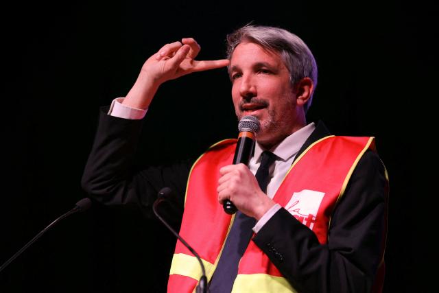 French humorist Guillaume Meurice addresses the audience during a French trade union General Confederation of Labour (CGT) meeting for trade union freedoms in Montreuil, near Paris on February 4, 2026. (Photo by Thomas SAMSON / AFP)