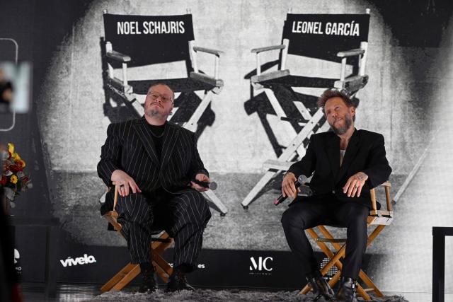 Leonel Garcia (L) and Noel Schajris of the Mexican musical duo Sin Bandera listen a question during the presentation of their latest album, titled "Escenas", at the St. Regis Hotel in Mexico City on February 4, 2026. (Photo by Alfredo ESTRELLA / AFP)