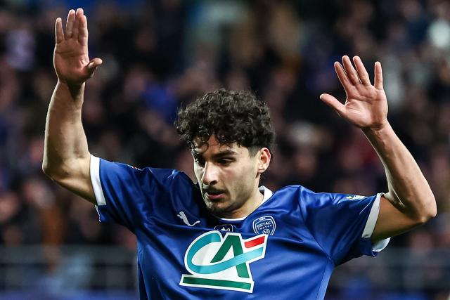 Troyes' French midfielder #05 Martin Adeline celebrates scoring his team's first goal during the French Cup round of 16 football match between Estac Troyes and Lens RC at the Stade de l'Aube in Troyes on February 4, 2026. (Photo by Sameer Al-DOUMY / AFP)