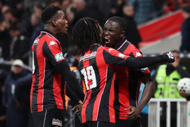 Nice's Senegalese defender #05 Antoine Mendy Medy (R) celebrates scoring his team's second goal during the French Cup round of 16 football match between OGC Nice CA and Montpellier HSC at the Allianz Riviera in Nice on February 4, 2026. (Photo by Valery HACHE / AFP)