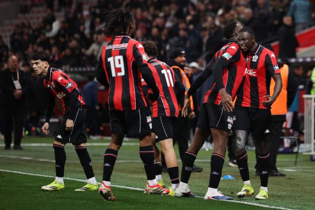 Nice's Senegalese defender #05 Antoine Mendy Medy (R) celebrates scoring his team's second goal during the French Cup round of 16 football match between OGC Nice CA and Montpellier HSC at the Allianz Riviera in Nice on February 4, 2026. (Photo by Valery HACHE / AFP)