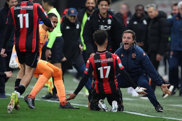 TOPSHOT - Nice's Moroccan forward #17 Sofiane Diop (R) celebrates scoring his team's third goal during the French Cup round of 16 football match between OGC Nice CA and Montpellier HSC at the Allianz Riviera in Nice on February 4, 2026. (Photo by Valery HACHE / AFP)