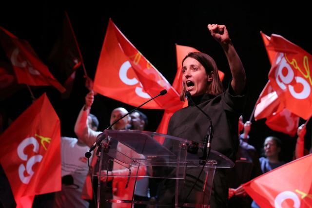 TOPSHOT - French trade union General Confederation of Labour (CGT) secretary general Sophie Binet gestures on stage as she addresses the audience during the audience during a French trade union General Confederation of Labour (CGT) meeting for trade union freedoms in Montreuil, near Paris on February 4, 2026. (Photo by Thomas SAMSON / AFP)