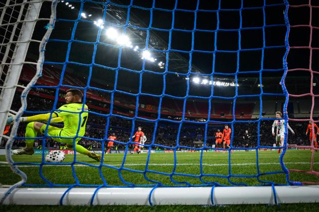Laval's French goakeeper #01 Maxime Hautbois concedes Lyon´s second goal during the French Cup round of 16 football match between Olympique Lyonnais and Laval Stade Mayenne FC at Groupama Stadium in Lyon on February 4, 2026. (Photo by OLIVIER CHASSIGNOLE / AFP)