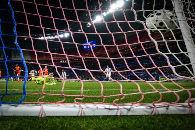 TOPSHOT - Lyon’s Brazilian forward #09 Endrick scores the first goal past Laval's French goakeeper #01 Maxime Hautboisduring the French Cup round of 16 football match between Olympique Lyonnais and Laval Stade Mayenne FC at Groupama Stadium in Lyon on February 4, 2026. (Photo by OLIVIER CHASSIGNOLE / AFP)