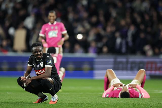 Amiens' Senegalese defender #03 Ababacar Lo (L) reacts at the end of the French Cup round of 16 football match between Toulouse FC and Amiens SCF at the Stadium de Toulouse in Toulouse on February 4, 2026. (Photo by Valentine CHAPUIS / AFP)