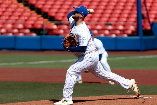 Leones del Escogido's #46 Travis Lakins pitches in the first inning of the Caribbean Series baseball tournament seventh game between Panama's Federales de Chiriqui and Dominican Republic's Leones del Escogido at the Panamerican Stadium in Jalisco, Mexico, on February 4, 2026. Pitcher (46) Republica Dominicana (primera Alta) (Photo by Ulises Ruiz / AFP)