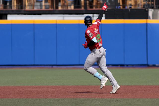 Federales de Chiriqui's #99 Jose Antonio Ramos celebrates during the second inning of the seventh game of the Caribbean Series baseball tournament seventh game between Panama's Federales de Chiriqui and Dominican Republic's Leones del Escogido at the Panamerican Stadium in Jalisco, Mexico, on February 4, 2026. (Photo by Ulises Ruiz / AFP)