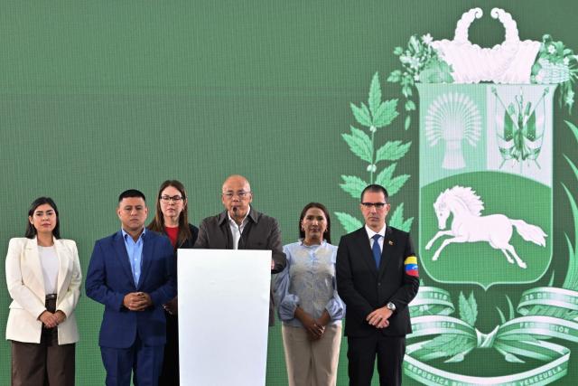 The President of the National Assembly of Venezuela, Jorge Rodriguez (2nd-R), speaks next to second vice-president Grecia Colmenares (L), first vice-president Pedro Jose Infante (2nd-L), and Deputy Jorge Arreaza during a press conference after a meeting with the Commission for Democratic Coexistence and Peace in Venezuela in Caracas on February 4, 2026. (Photo by Juan BARRETO / AFP)