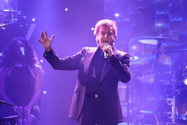 (FILES) US singer-songwriter Barry Manilow performs during the Recording Academy and Clive Davis' Salute To Industry Icons 50-Year Anniversary of the pre-Grammy gala at the Beverly Hilton hotel in Beverly Hills, California, on February 1, 2025. US singer-songwriter Barry Manilow on February 4 announced the cancellation of his upcoming run of shows in Las Vegas, but assured fans he was recovering well from surgery to remove lung cancer. The 82-year-old crooner, known for 1970s hits "Copacabana" and "Mandy," revealed a lung cancer diagnosis in December and planned to have an operation to treat it. "I'm doing great and recovering very well after my surgery," he said in a post on Instagram. (Photo by Michael Tran / AFP)