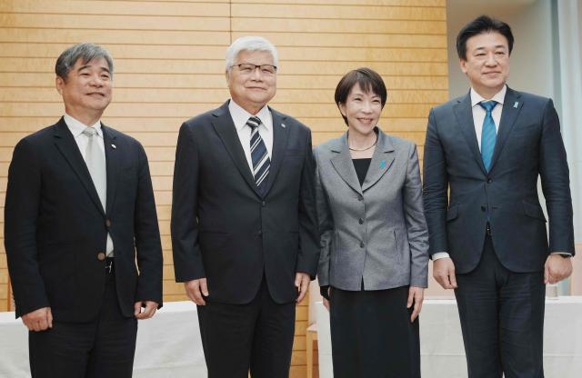 Japan's Prime Minister Sanae Takaichi (2nd R) and Chief Cabinet Secretary Minoru Kihara (R) pose with TSMC Chairman CC Wei (2nd L) and Vice President Jonathan Lee (L) at the beginning of their meeting at the Prime Minister's Office in Tokyo on February 5, 2026. (Photo by Kazuhiro NOGI / POOL / AFP)