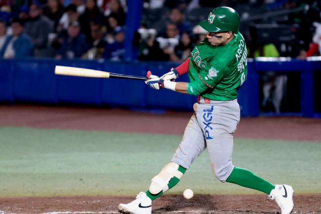 Tomateros de Culiacan's #27 Carlos Sepulveda bats in the fourth inning of the Caribbean Series baseball tournament eight game between Mexico's Tomateros de Culiacan and Mexico's Charros de Jalisco at the Panamerican Stadium in Jalisco, Mexico, on February 4, 2026. (Photo by Ulises Ruiz / AFP)