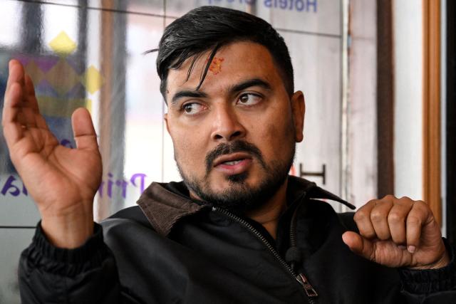 This photograph taken on February 3, 2026 shows Nepali Congress party election candidate Sachin Timalsena speaking during an interview with AFP in Kathmandu. Young election candidates are hoping to ride the wave of anger that toppled the previous government in Nepal, with 30 percent of the total registered for direct election aged under 40. The Himalayan country heads into landmark elections on March 5 -- the first since the deadly youth-led anti-corruption protest in 2025 spearheaded by protesters under the loose "Gen Z" umbrella title. (Photo by Prakash MATHEMA / AFP)