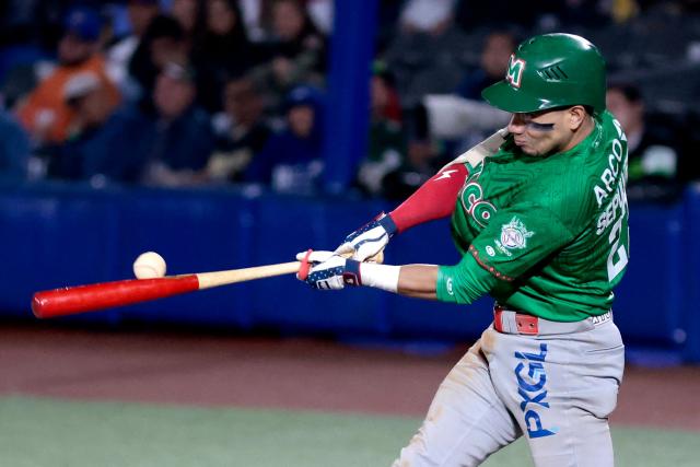 Tomateros de Culiacan's #27 Carlos Sepulveda bats in the sixth inning of the Caribbean Series baseball tournament eight game between Mexico's Tomateros de Culiacan and Mexico's Charros de Jalisco at the Panamerican Stadium in Jalisco, Mexico, on February 4, 2026. (Photo by Ulises Ruiz / AFP)