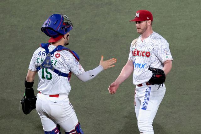 Players of Charros de Jalisco celebrate at the end of the ninth inning of the Caribbean Series baseball tournament eight game between Mexico's Tomateros de Culiacan and Mexico's Charros de Jalisco at the Panamerican Stadium in Jalisco, Mexico, on February 4, 2026. (Photo by Ulises Ruiz / AFP)
