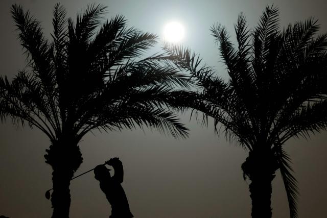 France's Martin Couvra plays a shot on day one of the Qatar Masters 2026 at Doha Golf Club, in Doha on February 5, 2026. (Photo by Karim JAAFAR / AFP)