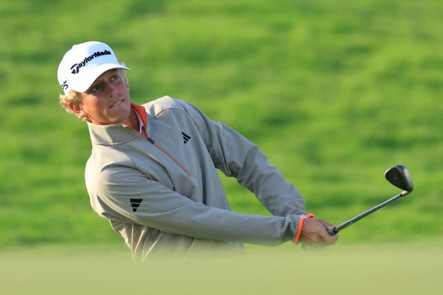 France's Martin Couvra plays a shot on the 16th hole on day one of the Qatar Masters 2026 at Doha Golf Club, in Doha on February 5, 2026. (Photo by Karim JAAFAR / AFP)