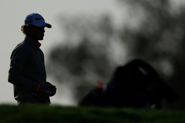 France's Martin Couvra looks down the course on day one of the Qatar Masters 2026 at Doha Golf Club, in Doha on February 5, 2026. (Photo by Karim JAAFAR / AFP)