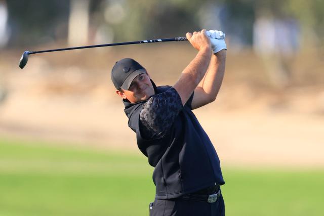 US Patrick Reed plays a shot on day one of the Qatar Masters 2026 at Doha Golf Club, in Doha on February 5, 2026. (Photo by Karim JAAFAR / AFP)