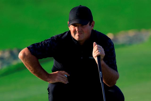 US Patrick Reed eyes a shot on day one of the Qatar Masters 2026 at Doha Golf Club, in Doha on February 5, 2026. (Photo by Karim JAAFAR / AFP)