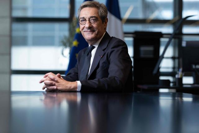 (FILES) France's Trade Minister, Serge Papin poses during a photo session in his office at the French Ministry for the Economy and Finances, also known as "Bercy", in Paris on November 10, 2025. "Direct", a proponent of "compromise" and drawing on his field experience, the former self-taught boss of Systeme U, Serge Papin, is imprinting his style on the Ministry of Trade, calling for "showing one's fist" against "Chinese-American predators," Shein in the lead. (Photo by JOEL SAGET / AFP)