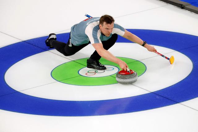 Norway's Magnus Nedregotten curls the stone in the curling mixed doubles round robin between Norway and USA during the Milano Cortina 2026 Winter Olympic Games at the Cortina Curling Olympic Stadium in Cortina d’Ampezzo on February 5, 2026. (Photo by Odd ANDERSEN / AFP)