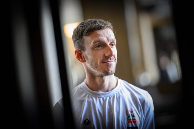 Tour of Oman cycling race two-time title holder UAE British cyclist Adam Yates poses two days prior to take the start of the 2026 Tour of Oman, in Muscat on February 5, 2026. (Photo by Loic VENANCE / AFP)