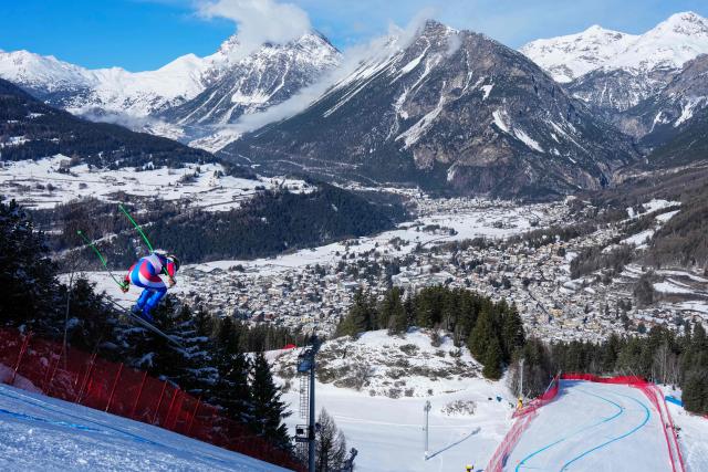 France's Nils Allegre soars over a jump during the second official training for the men's downhill alpine skiing event ahead of the Milano Cortina 2026 Winter Olympic Games at the Stelvio Ski Centre in Bormio (Valtellina) on February 5, 2026. (Photo by Dimitar DILKOFF / AFP)