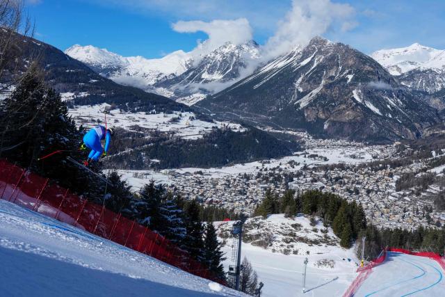 Italy's Dominik Paris soars over a jump during the second official training for the men's downhill alpine skiing event ahead of the Milano Cortina 2026 Winter Olympic Games at the Stelvio Ski Centre in Bormio (Valtellina) on February 5, 2026. (Photo by Dimitar DILKOFF / AFP)