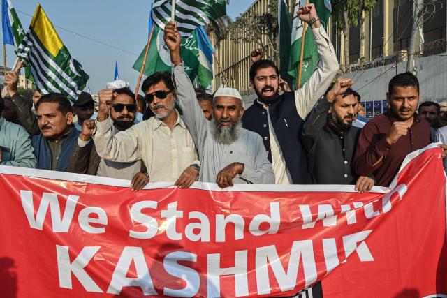 Activists and supporters of the Jamaat-e-Islami party take part in a rally to mark Pakistan's Kashmir Solidarity Day in Karachi on February 5, 2026. (Photo by Asif HASSAN / AFP)