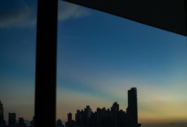 View of the skyline in Paitilla neighborhood during sunrise in Panama City, on February 5, 2026. (Photo by MARTIN BERNETTI / AFP)
