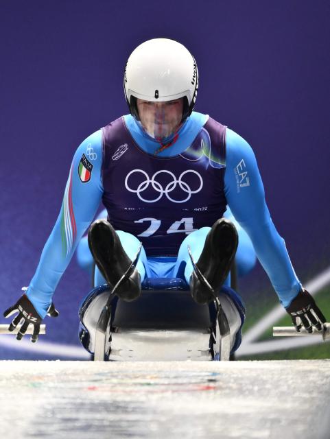 Italy's Alex Gufler takes part in the luge men's singles training session at Cortina Sliding Centre during the Milano Cortina 2026 Winter Olympic Games in Cortina d'Ampezzo on February 5, 2026. (Photo by Marco BERTORELLO / AFP)