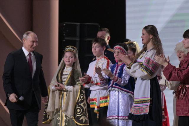 In this pool photograph distributed by the Russian state agency Sputnik, Russia's President Vladimir Putin attends a ceremony opening the Year of Unity of the Peoples of Russia, in Moscow on February 5, 2026. (Photo by Alexey NIKOLSKY / POOL / AFP)