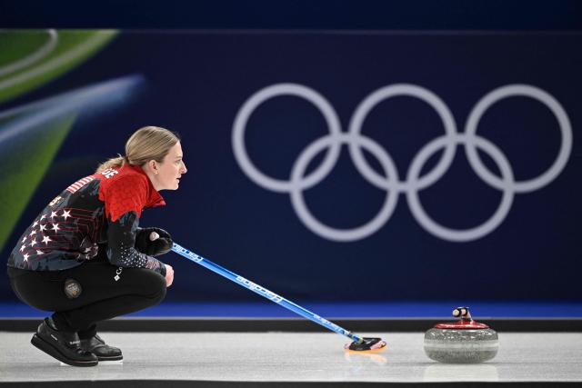 US' Cory Thiesse watches while competing in the curling mixed doubles round robin between USA and Switzerland during the Milano Cortina 2026 Winter Olympic Games at the Cortina Curling Olympic Stadium in Cortina d’Ampezzo on February 5, 2026. (Photo by Tiziana FABI / AFP)