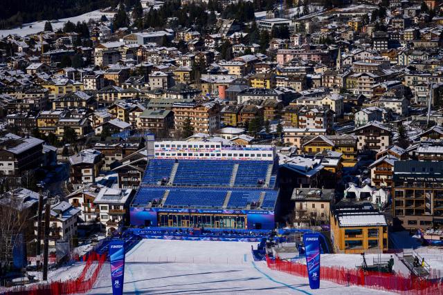 This photograph taken on February 5, 2026,  shows the main tribune in the finish area of the Stelvio Alpine Skiing Centre, hosting to the men's Alpine skiing events of the Milano Cortina 2026 Winter Olympic Games in Bormio (Valtellina) on February 5, 2026. (Photo by DIMITAR DILKOFF / AFP)