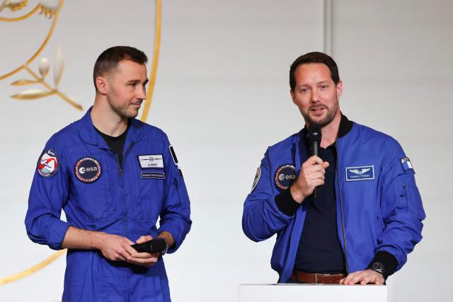 ESA (European Space Agency) French astronaut Thomas Pesquet (R) next to French astronaut Arnaud Prost addresses the audience ahead of a public video conference with French astronaut Sophie Adenot ahead of her departure for the International Space Station, at the presidential Elysee Palace in Paris on February 5, 2026. Four astronauts could blast off to the International Space Station (ISS) next week, after setbacks including a mysterious medical evacuation of the previous crew, last-minute rocket problems, and some scheduling conflicts with NASA's Moon mission. (Photo by Ludovic MARIN / POOL / AFP)