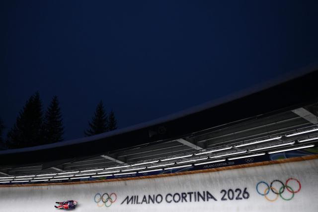 USA's Ashley Farquharson takes part in the luge women's singles training session at Cortina Sliding Centre during the Milano Cortina 2026 Winter Olympic Games in Cortina d'Ampezzo on February 5, 2026. (Photo by Marco BERTORELLO / AFP)