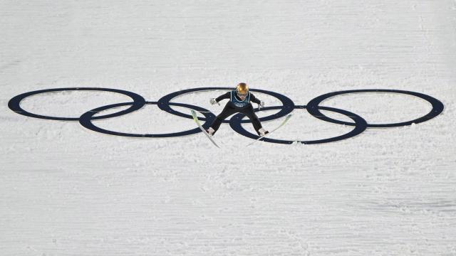 France's Josephine Pagnier jumps during the first round of the women's ski jumping normal hill training of the Milano Cortina 2026 Winter Olympic Games at Predazzo Ski Jumping Stadium in Predazzo (Val di Fiemme), on February 5, 2026. (Photo by Javier SORIANO / AFP)