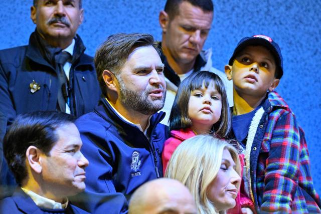 US Vice President JD Vance (C), his children Mirabel and Ewan, and US Secretary of State Marco Rubio (L) attends the women's preliminary round Group A Ice Hockey match between USA and Czech Republic at the Milano Rho Ice Hockey Arena during the Milano Cortina 2026 Winter Olympic Games in Milan, on February 5, 2026. (Photo by Alexander NEMENOV / AFP)