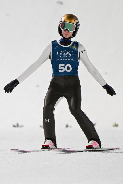 Slovenia's Nika Prevc arrives in the finish area after she jumped during the women's ski jumping normal hill training of the Milano Cortina 2026 Winter Olympic Games at Predazzo Ski Jumping Stadium in Predazzo (Val di Fiemme), on February 5, 2026. (Photo by Javier SORIANO / AFP)